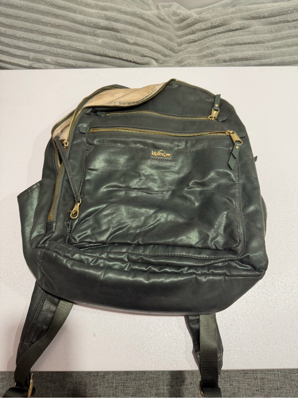Kipling Metallic Dark Green Backpack with Gold Hardware